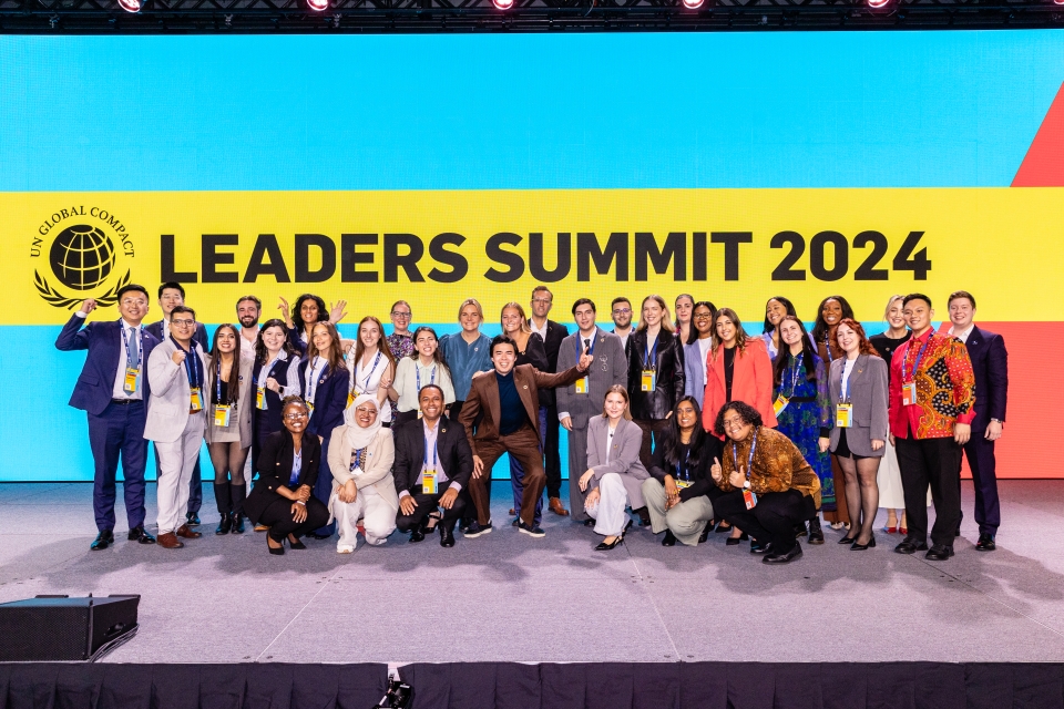 happy crowd on stage at leaders summit